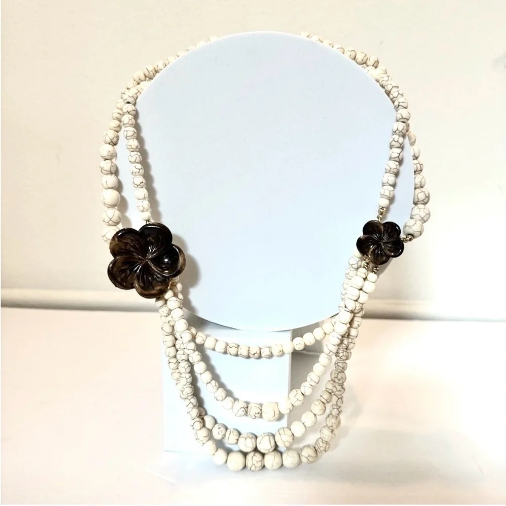 Gorgeous earth tone beaded necklace with brown floral accents